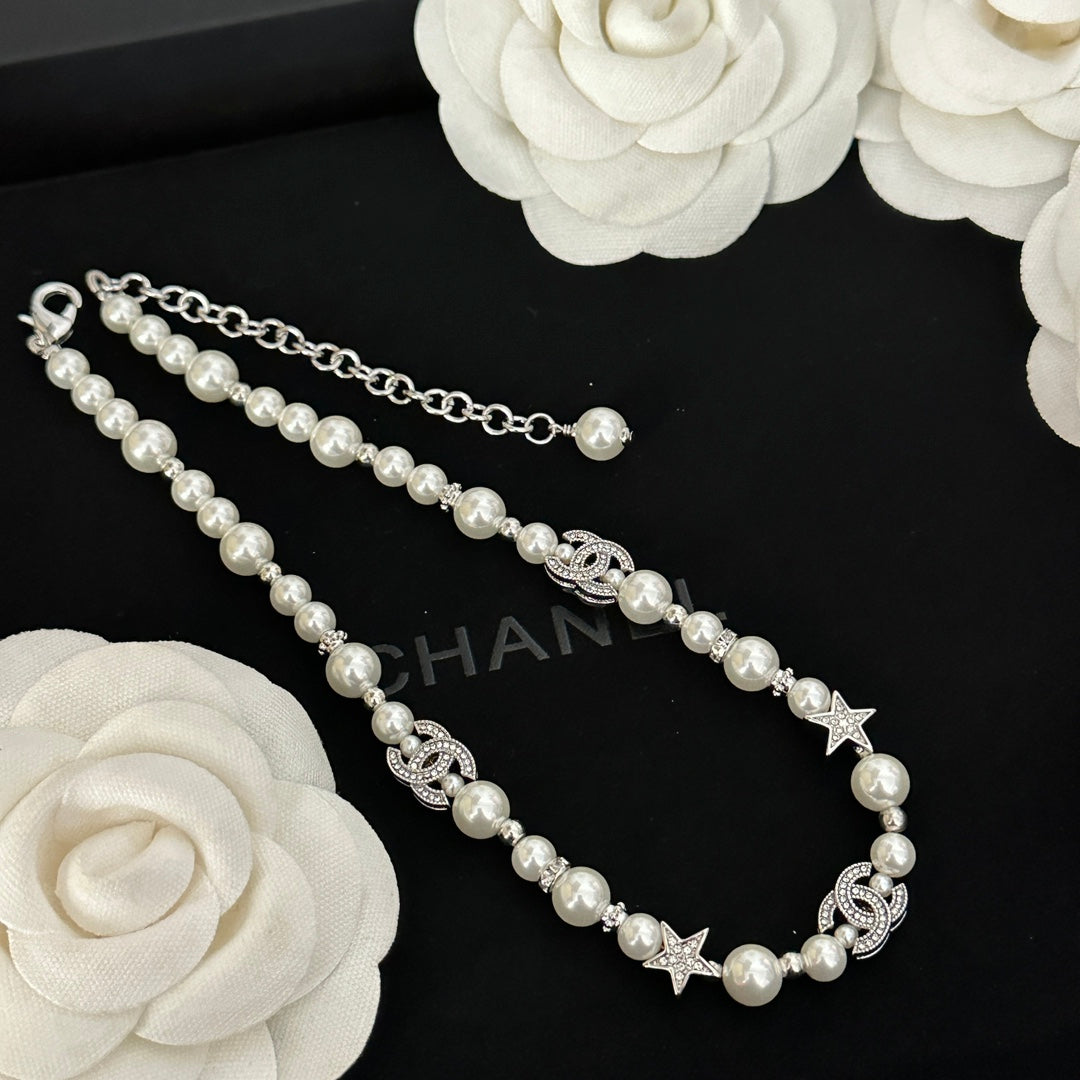 Chanel CC Rhinestone Star Pendant Necklace Silvery Silver Metal ref.1066778  - Joli Closet