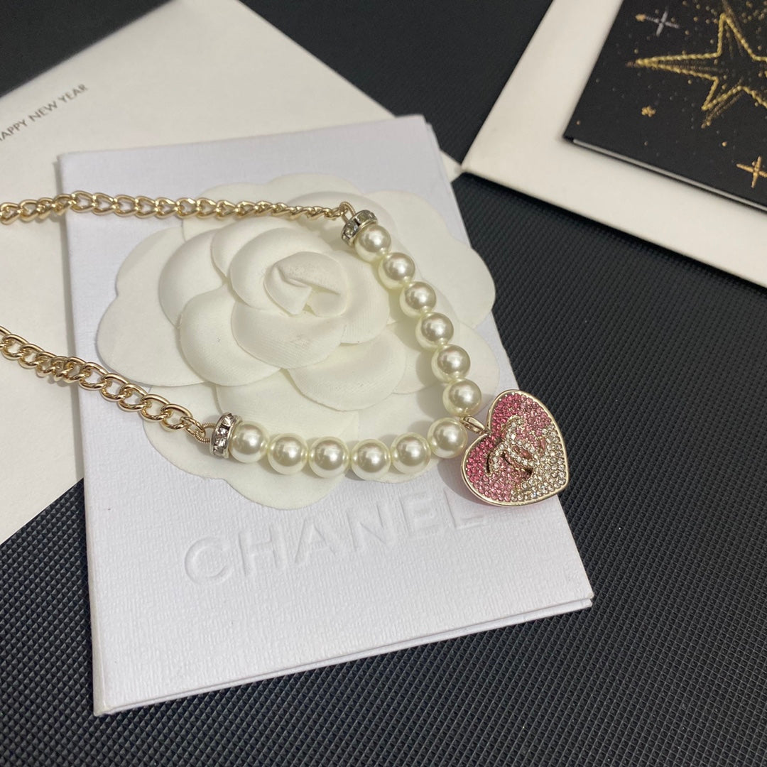 pearl necklace pink chanel pendant